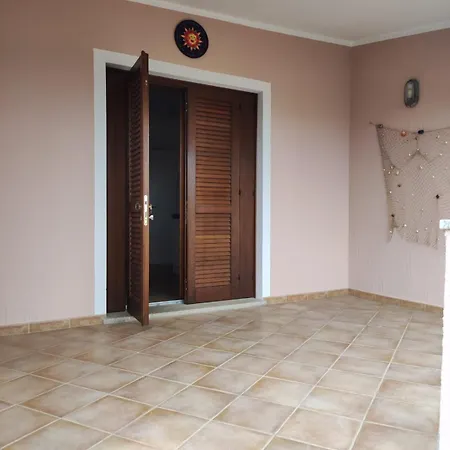 Baia Caddinas, Holiday home *